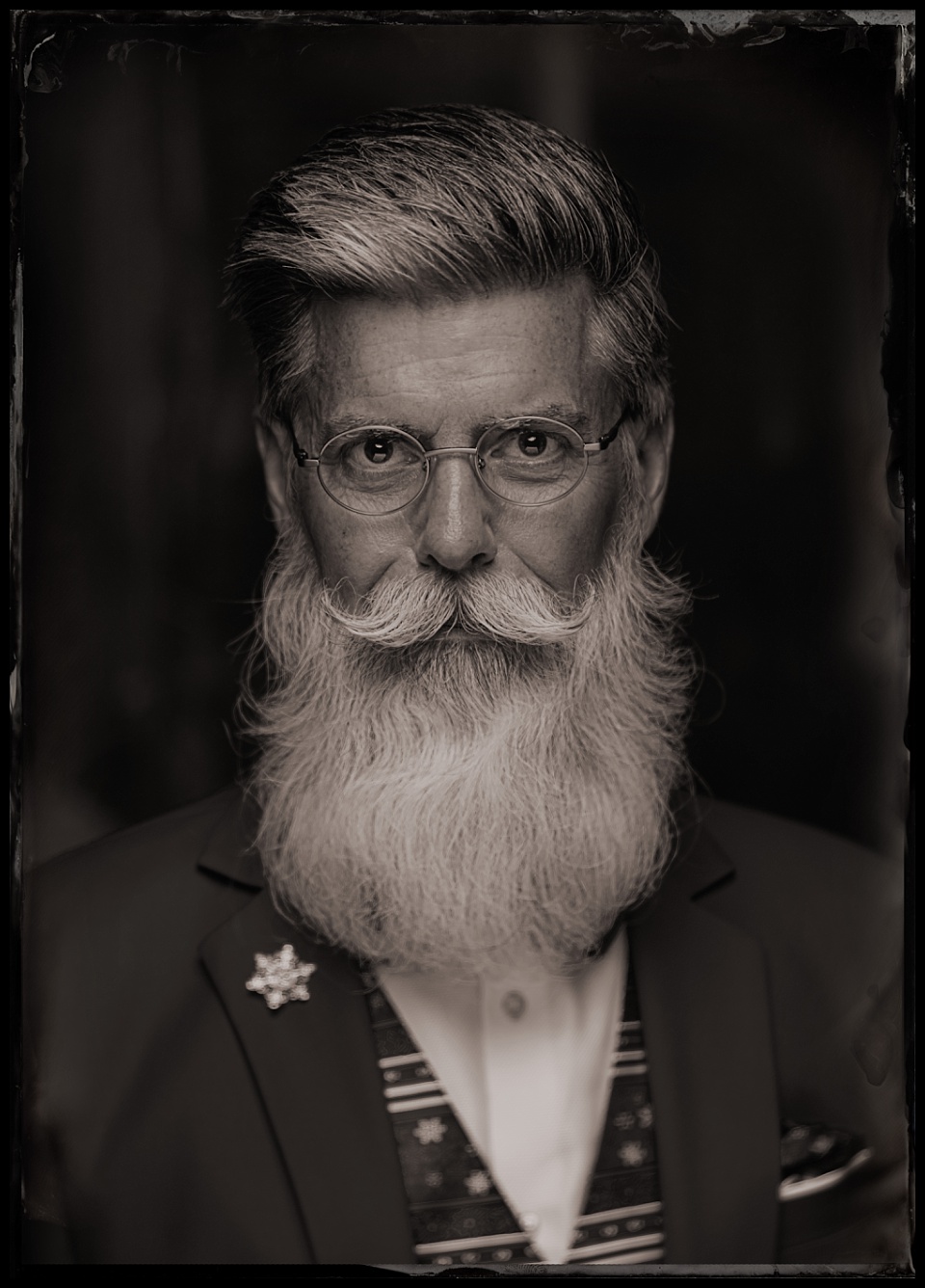 tintype of a dapper santa at the mile high beard bout