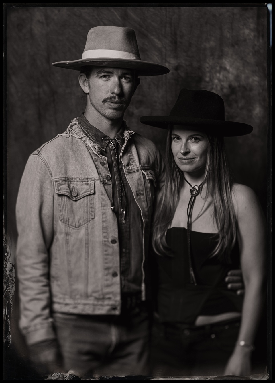 devils thumb ranch wedding tintype photobooth couples portrait with great hats and bolo ties