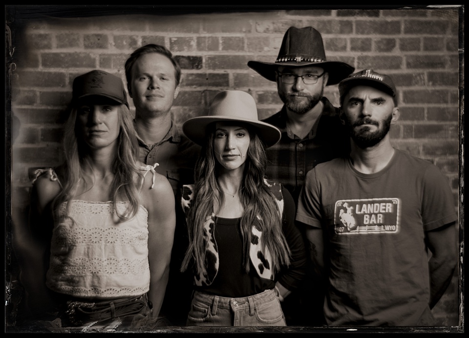 tintype photobooth wild west winterfest group portrait of 5 people looking intense